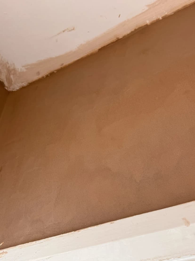 Completed damp proofing and plastering project showing quality workmanship